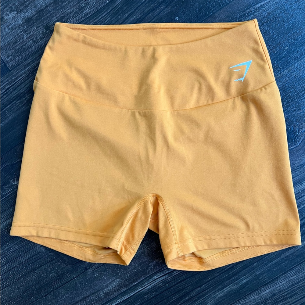 Gymshark training shorts, orange, size M